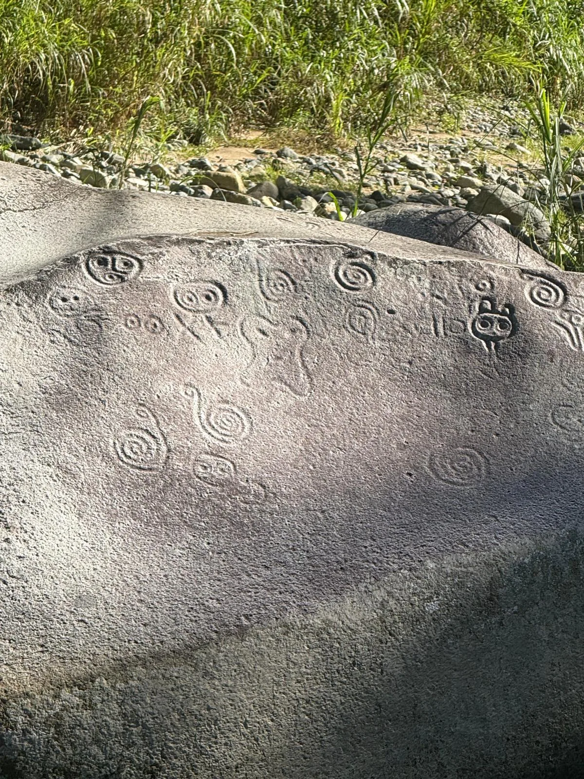 Taíno petroglyphs Piedra Escrita Jayuya riverbed Puerto Rico