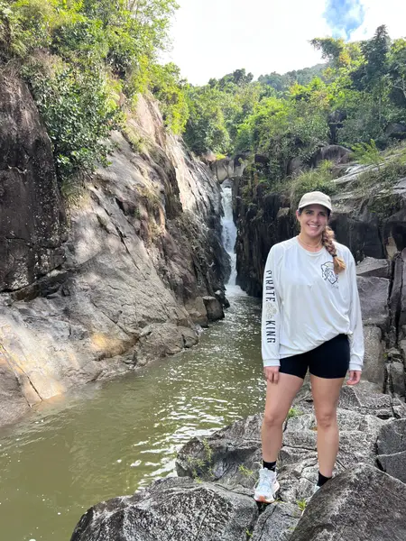 Small group tour guests at Charco El Hippie river pool in Naguabo Puerto Rico